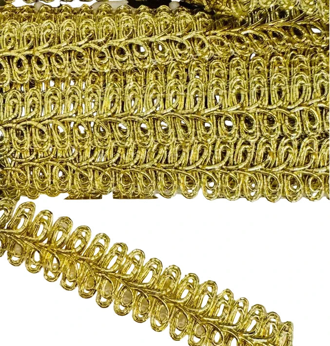 Gold bullion trim on a white background