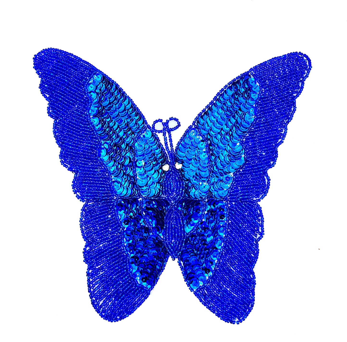 Blue sequin and bead butterfly-shaped patch with sequins on a white background