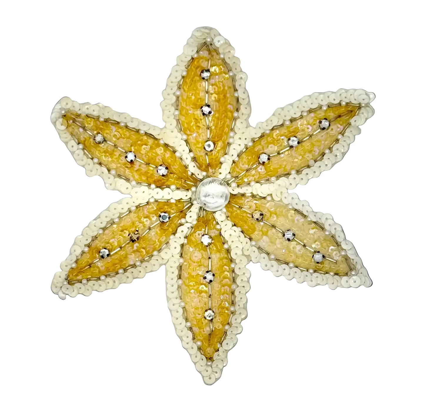 A six-pointed star-shaped brooch featuring textured yellow petals with rhinestone accents and a white scalloped border.