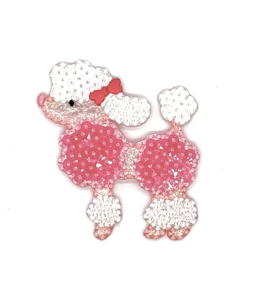 Sequined poodle patch with pink body and white paws on a white background