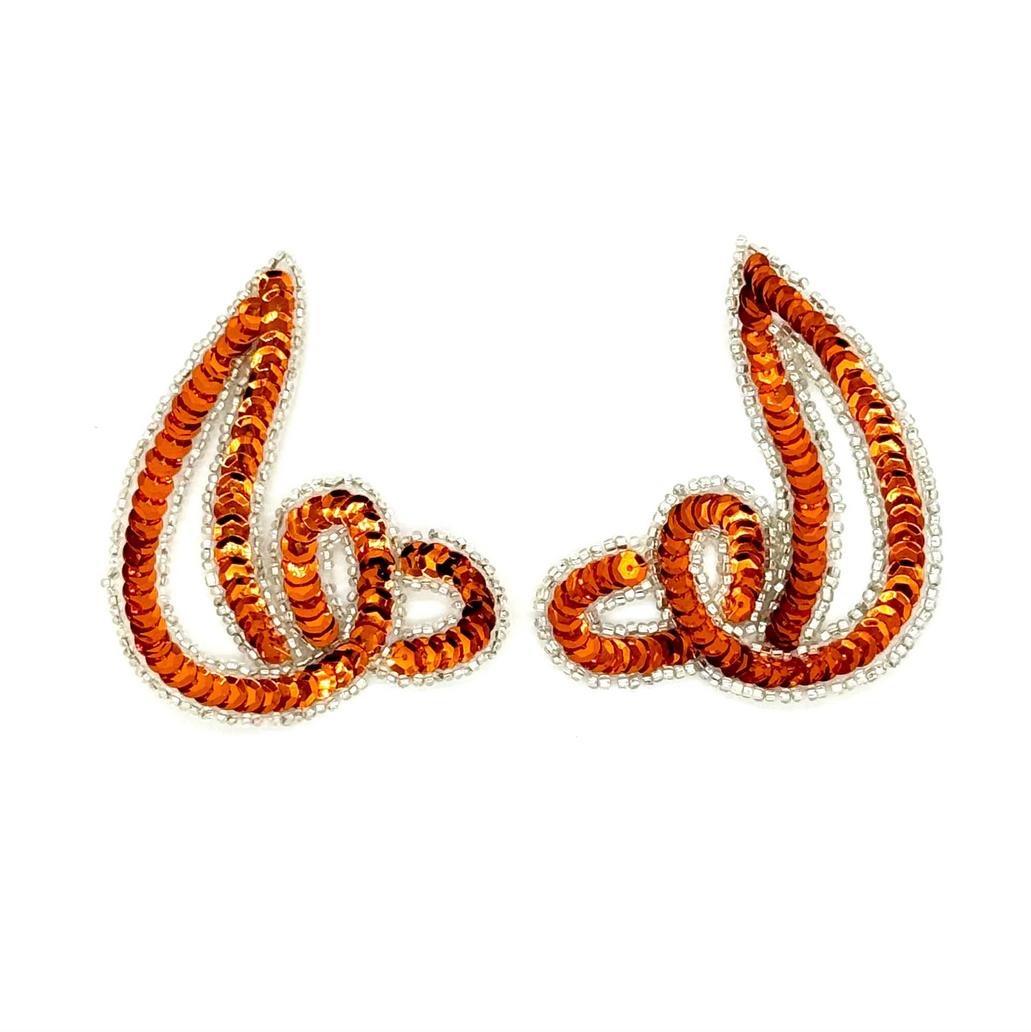 Pair of orange and silver sequin appliqués on a white background