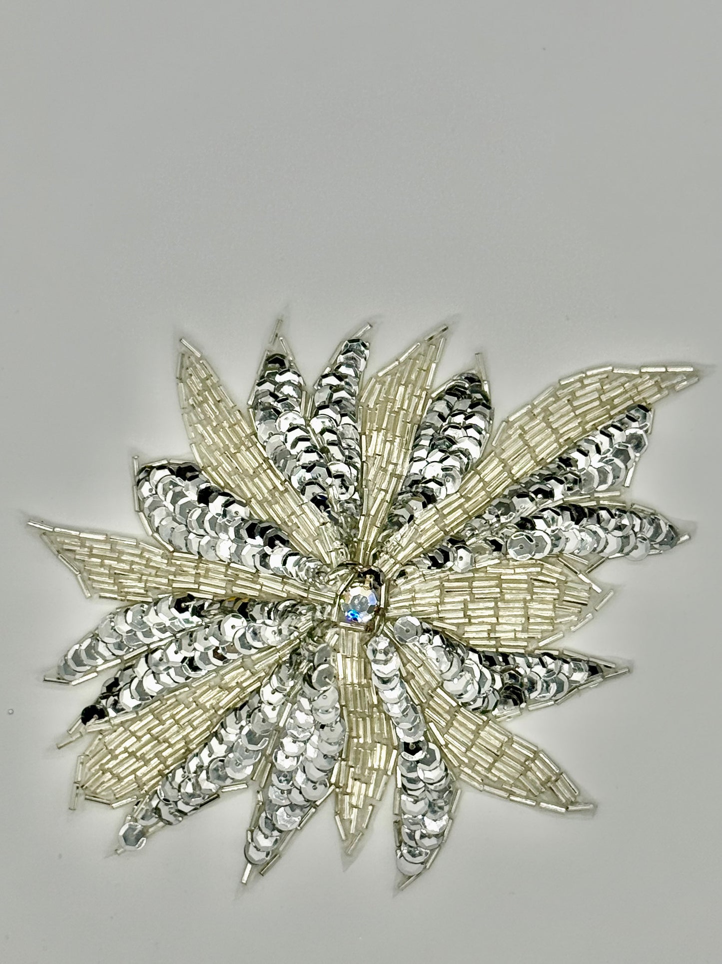 Silver sequins and beading with rhinestone center 5" X 6.5"