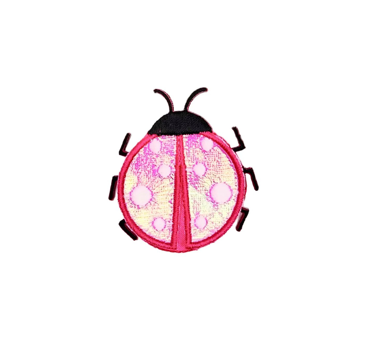 Iron-on embroidered ladybug patch with pink and black pattern on a white background