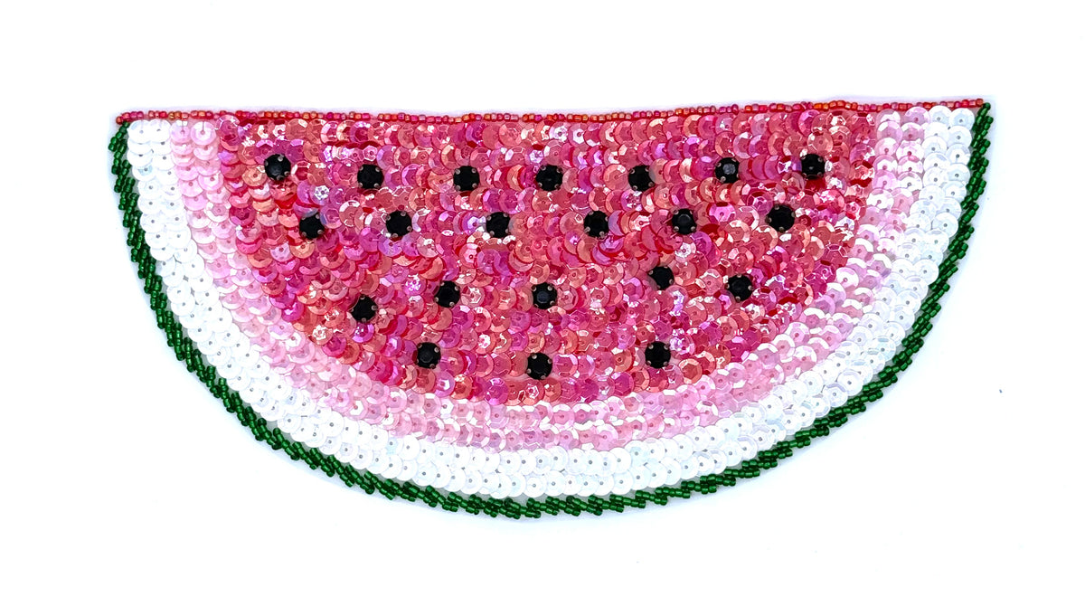 Sequined watermelon slice design on a white background