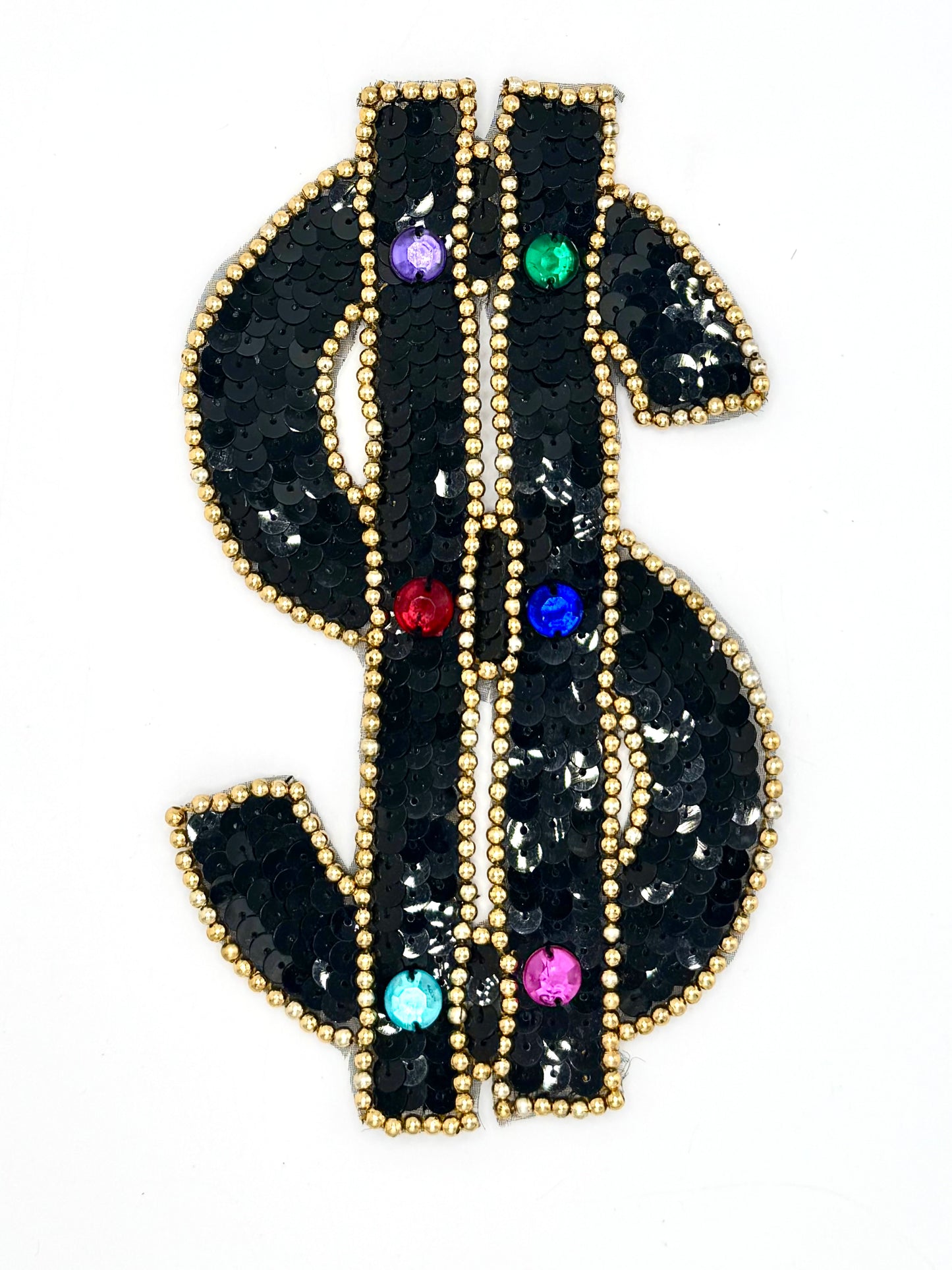 Signo de dólar con lentejuelas negras, cuentas doradas y pedrería multicolor de 15 x 9 cm