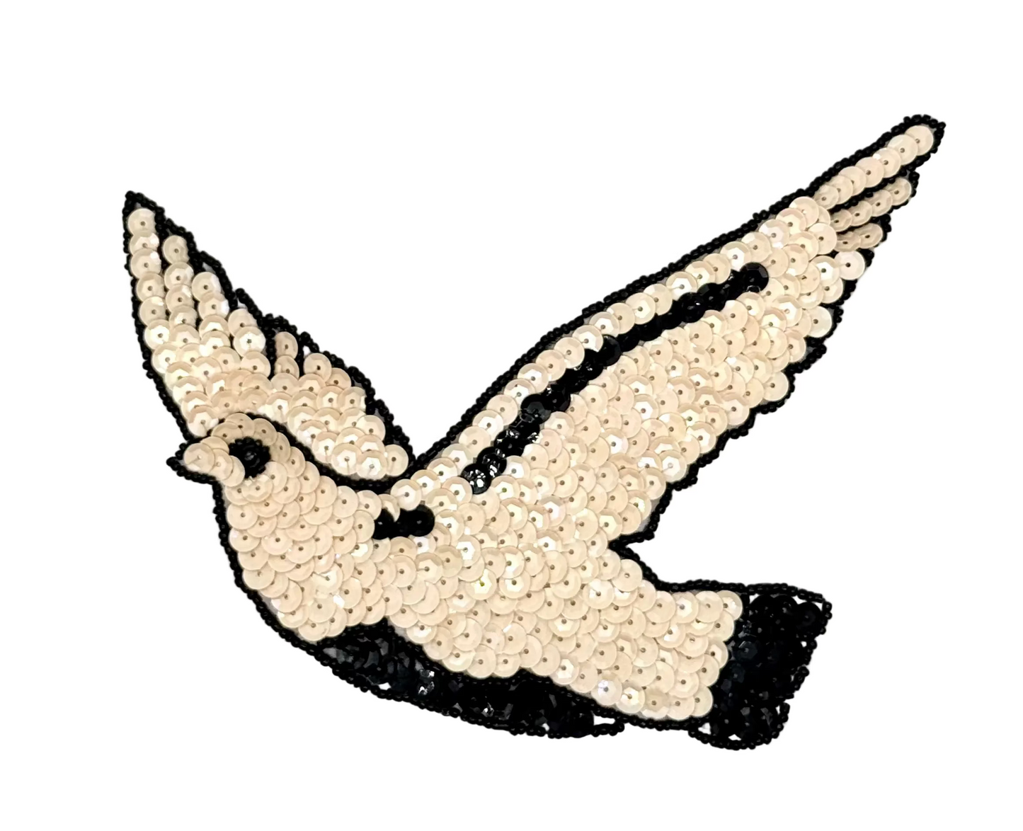 Sequined bird design on a white background