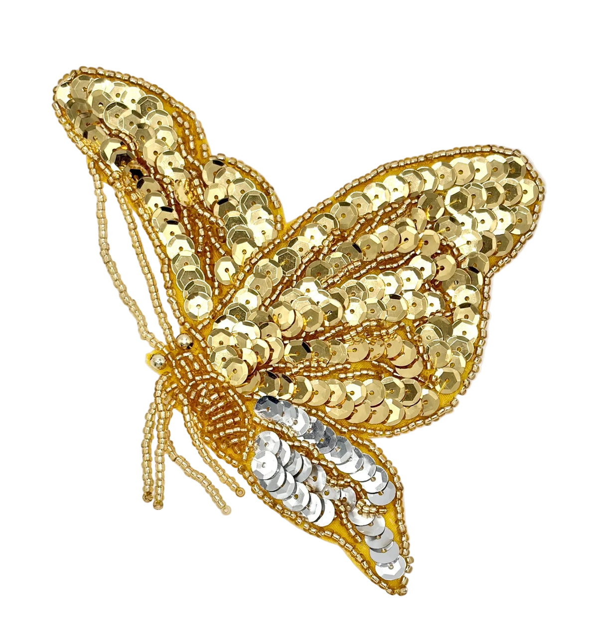 Gold sequin butterfly decorative item on a white background