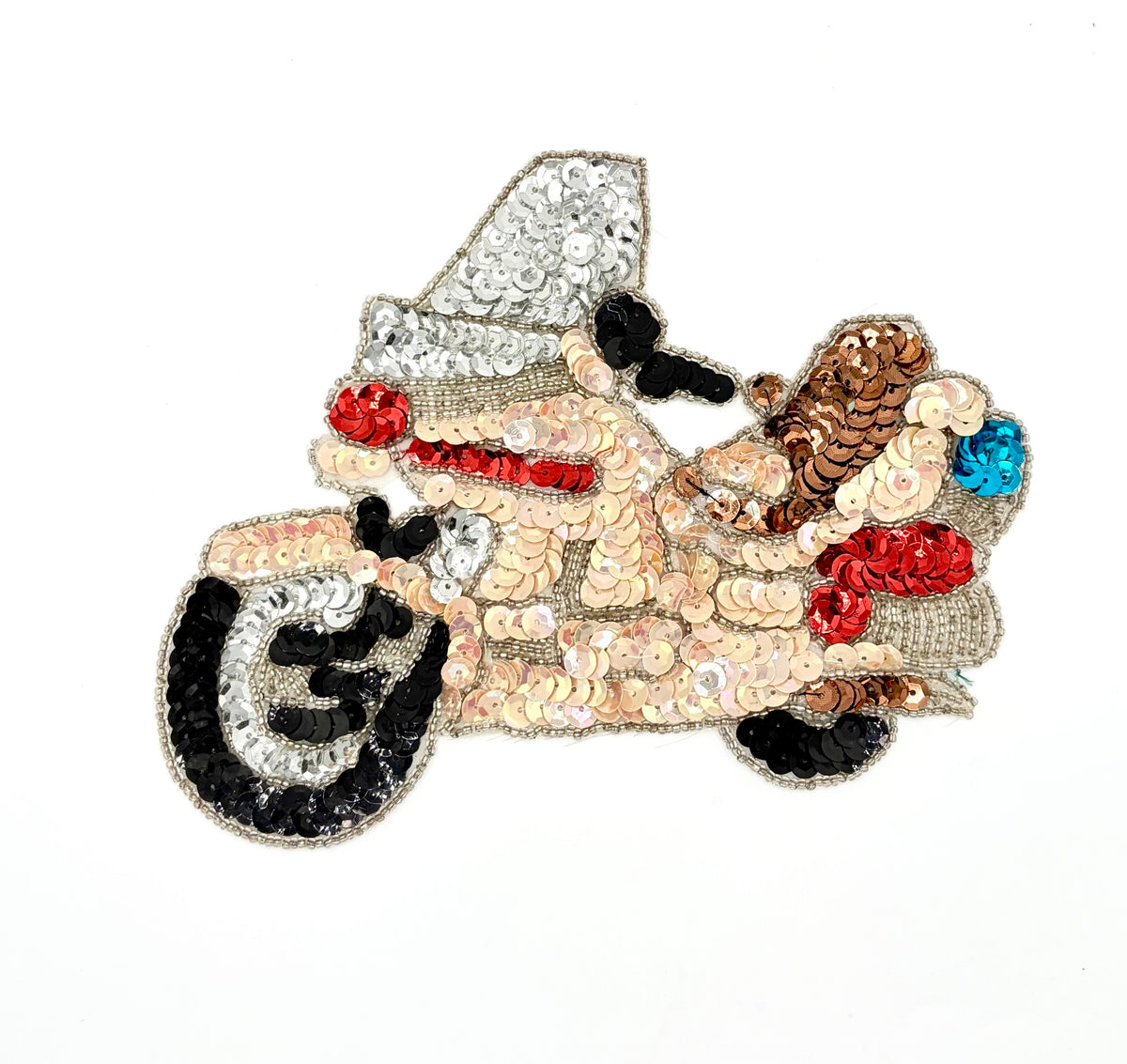 A decorative embroidered patch shaped like a motorcycle covered in sequins and beads. The patch features a mix of metallic silver, beige, black, red, brown, and blue sequins and beadwork, set against a plain white background.