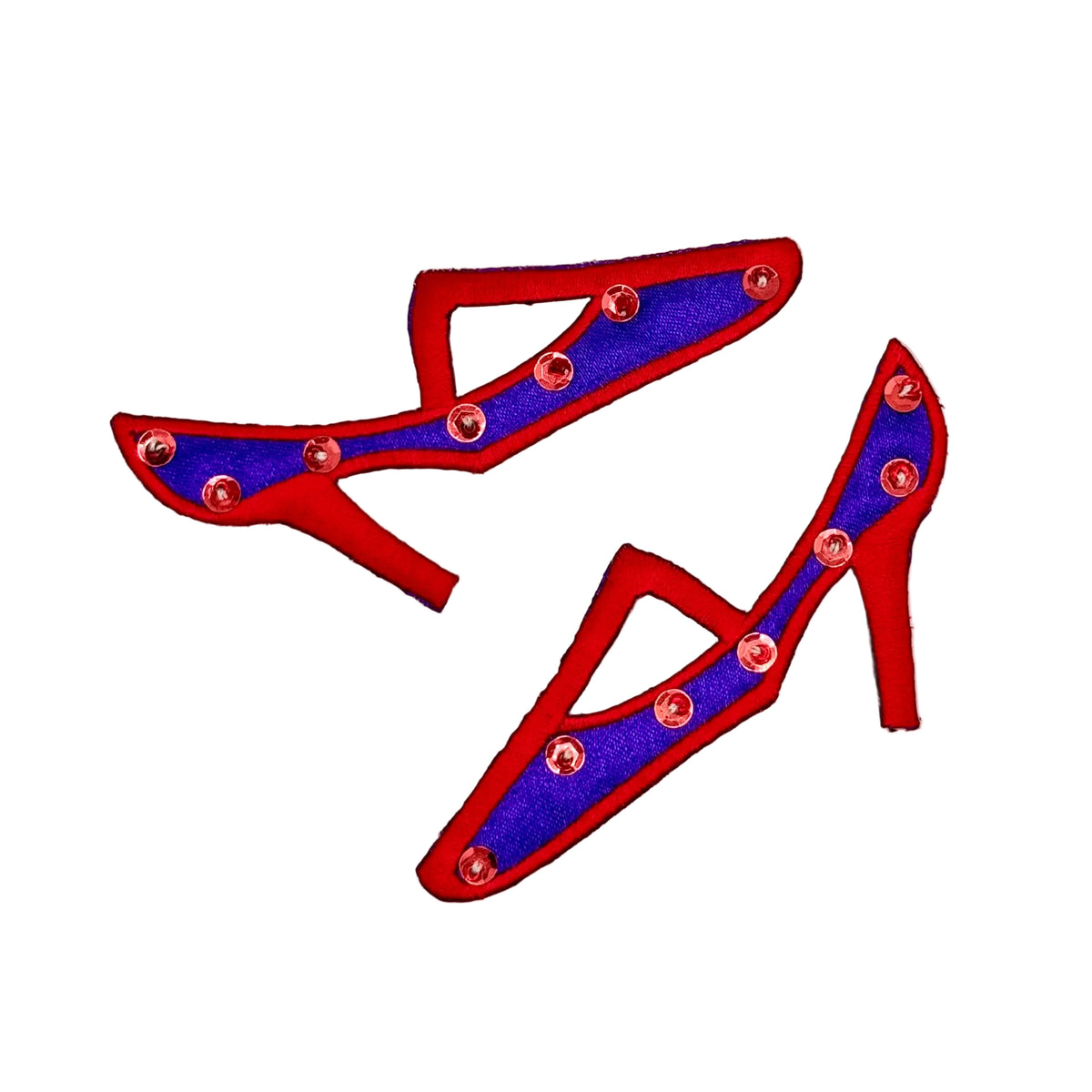 A pair of red and purple high-heeled shoe-shaped embellishments decorated with red sequins and beads, shown on a plain white background.