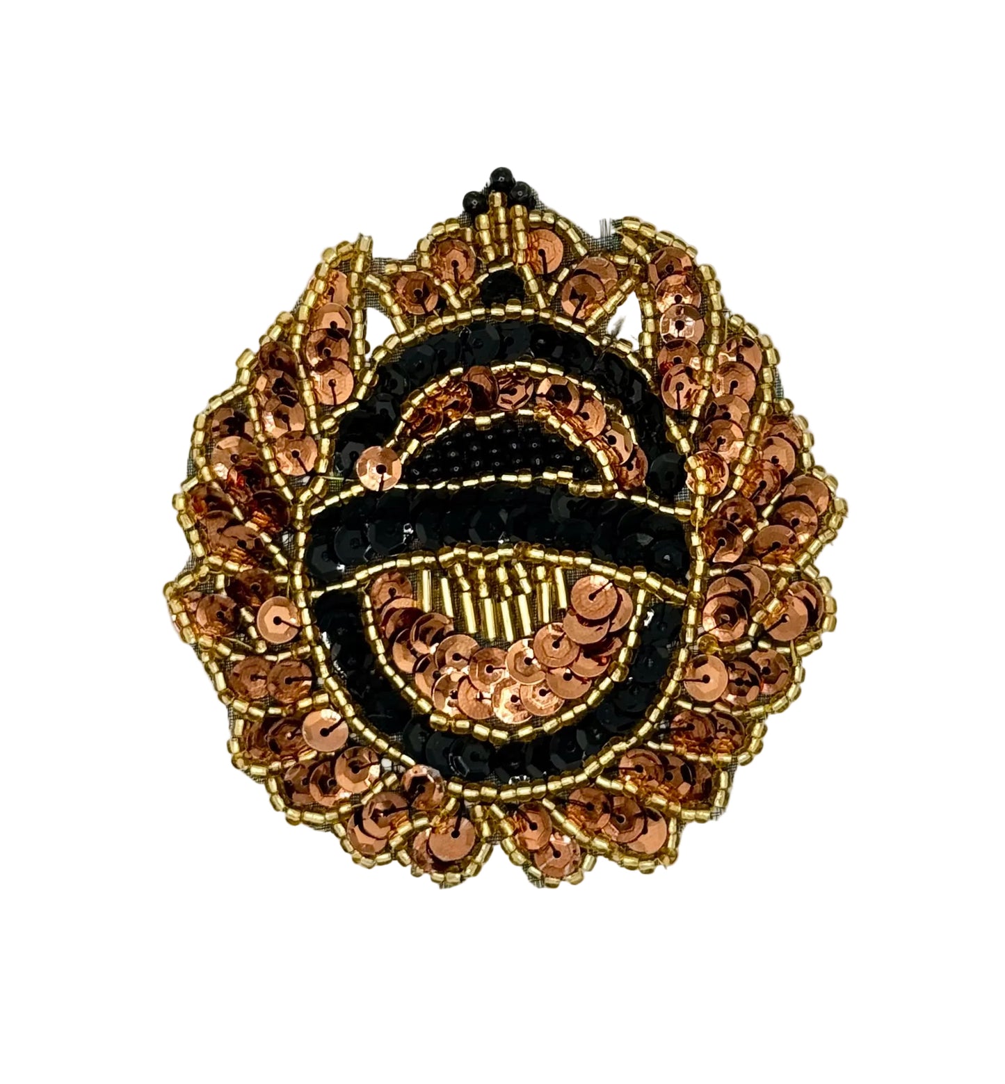 Sequin and bead crest. Bronze and black sequins and black and gold beads on a white background.