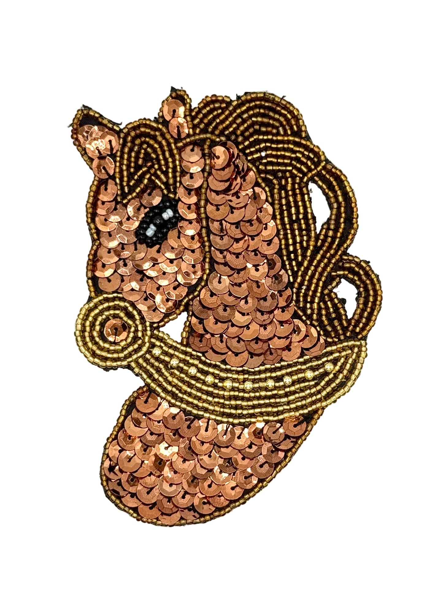 Sequined and beaded horse head design on a white background