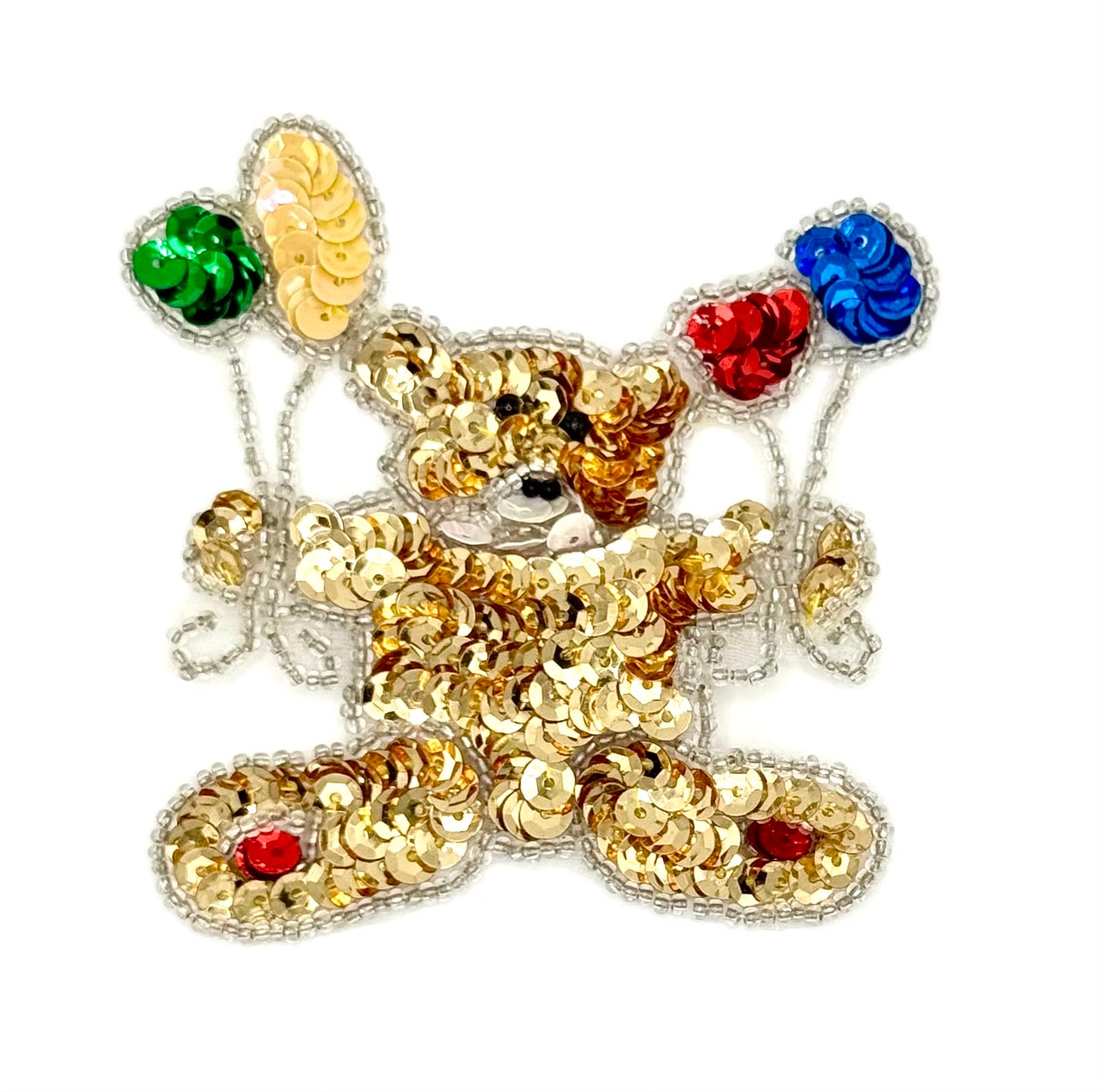 Gold teddy bear-shaped patch with sequins and beads on a white background
