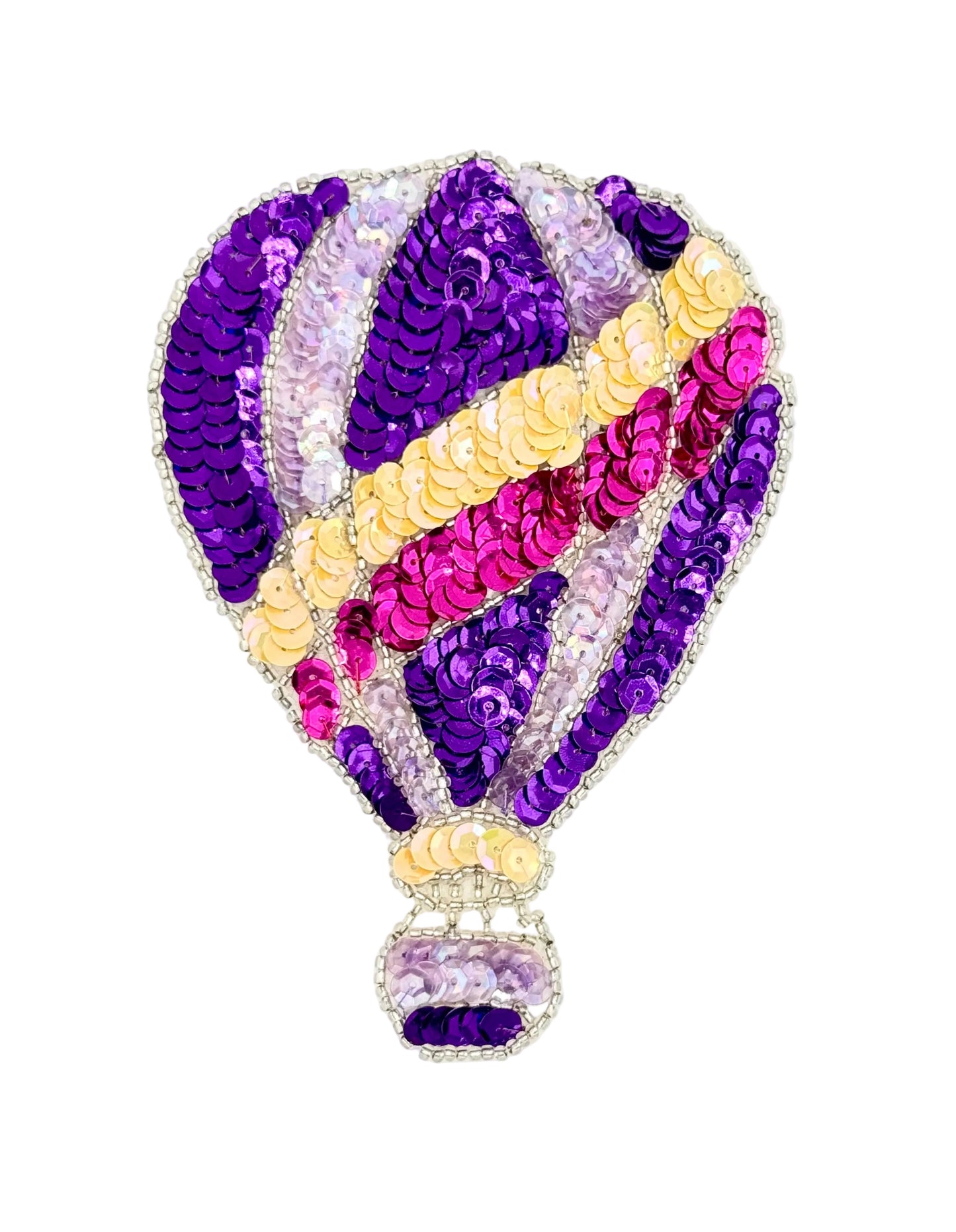 Colorful hot air balloon made of sequins on a white background