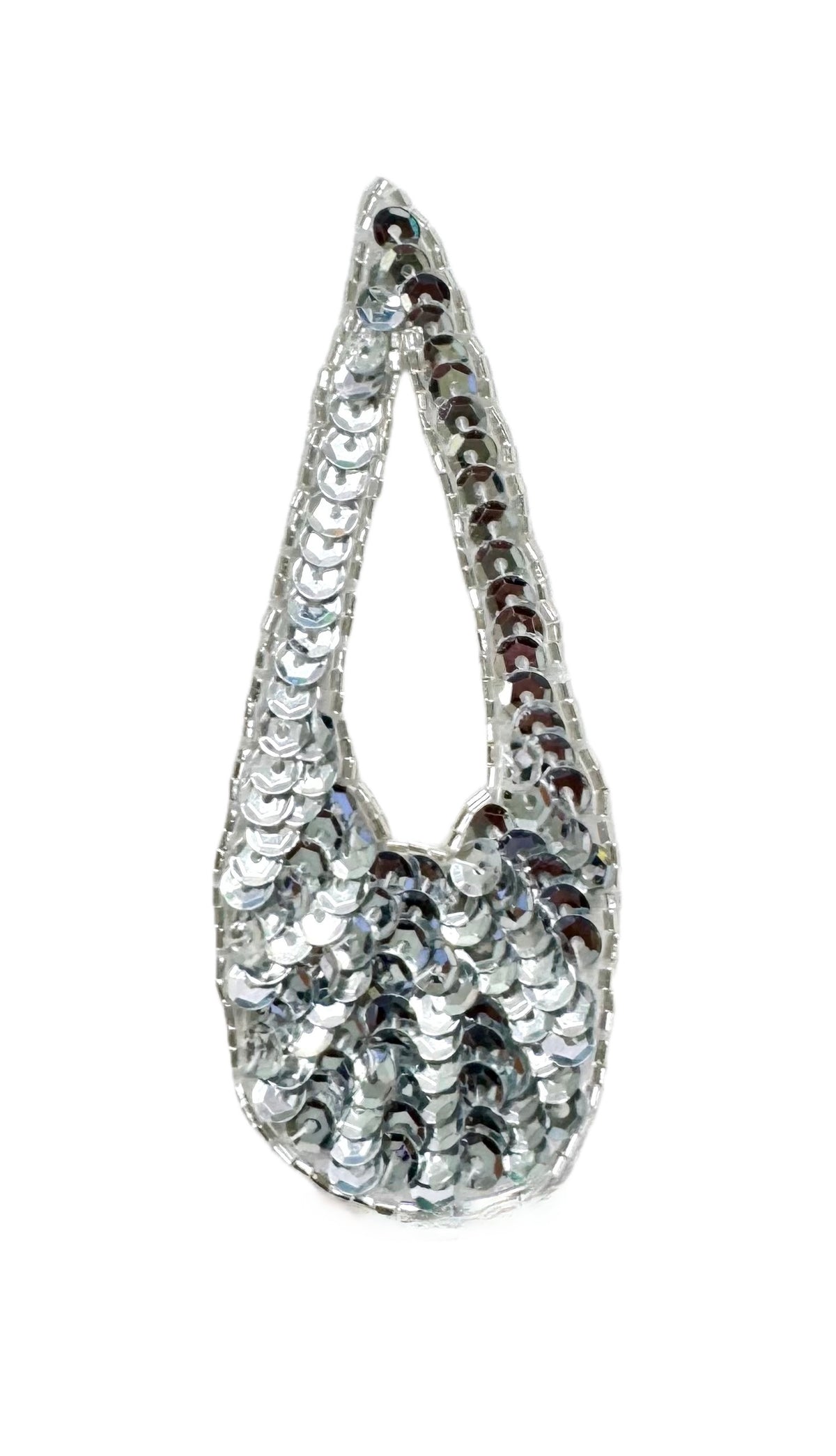 Teardrop shaped patch with silver sequins and glass beads on a white background.
