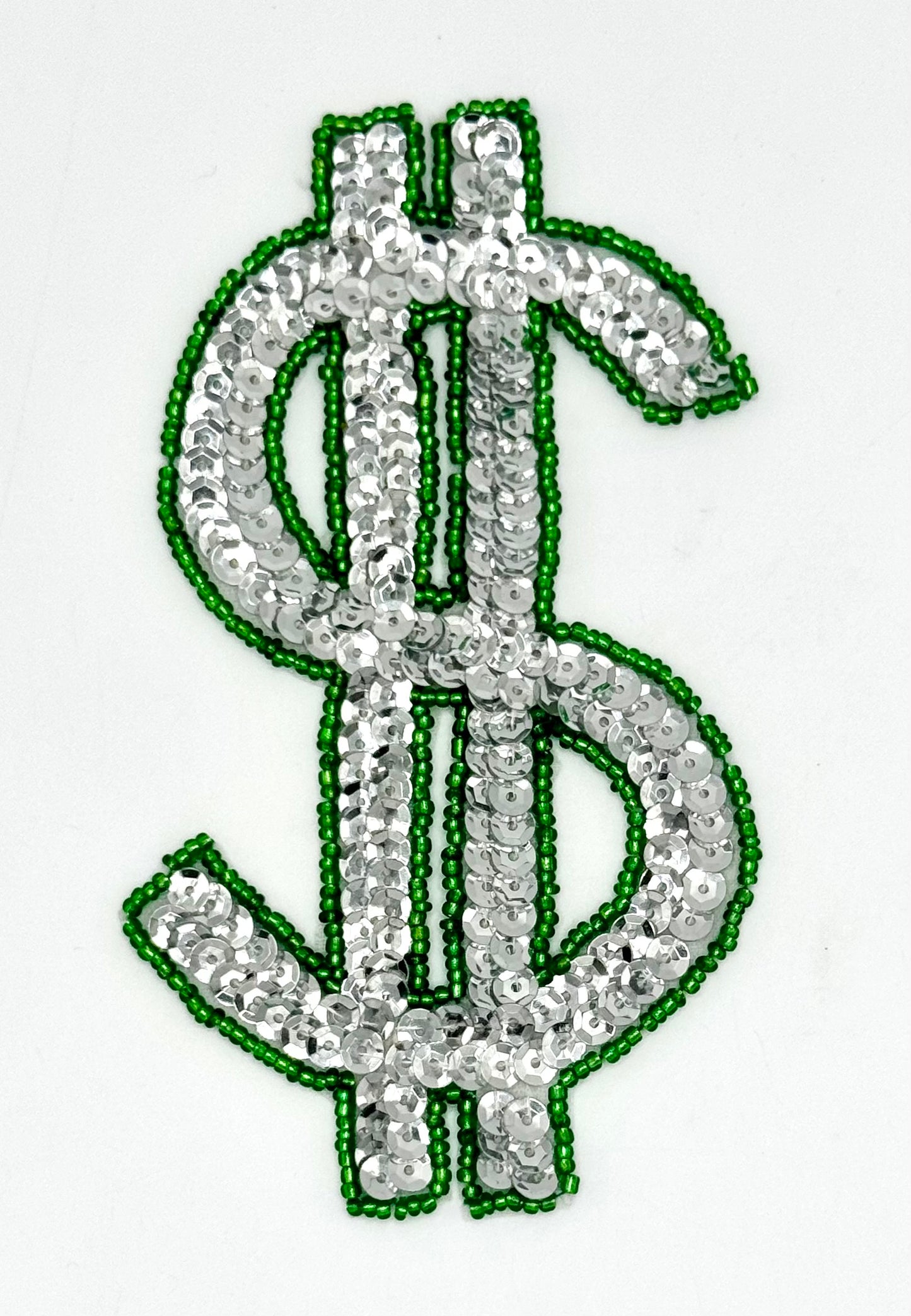 Signo de dólar, lentejuelas plateadas y cuentas verdes de 4.75" x 2.75"