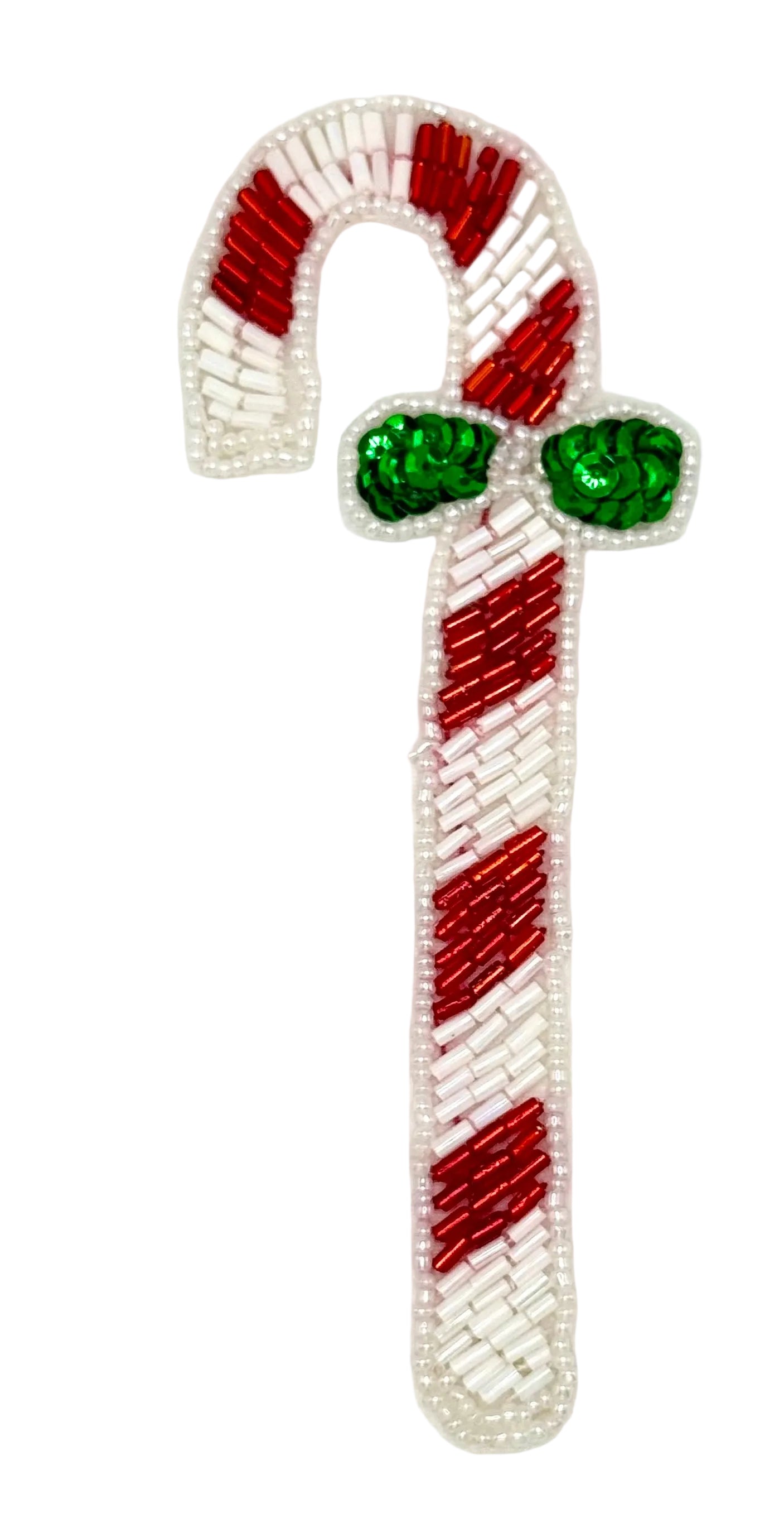Decorative sequin and bead candy cane with red and white stripes and green accents on a white background