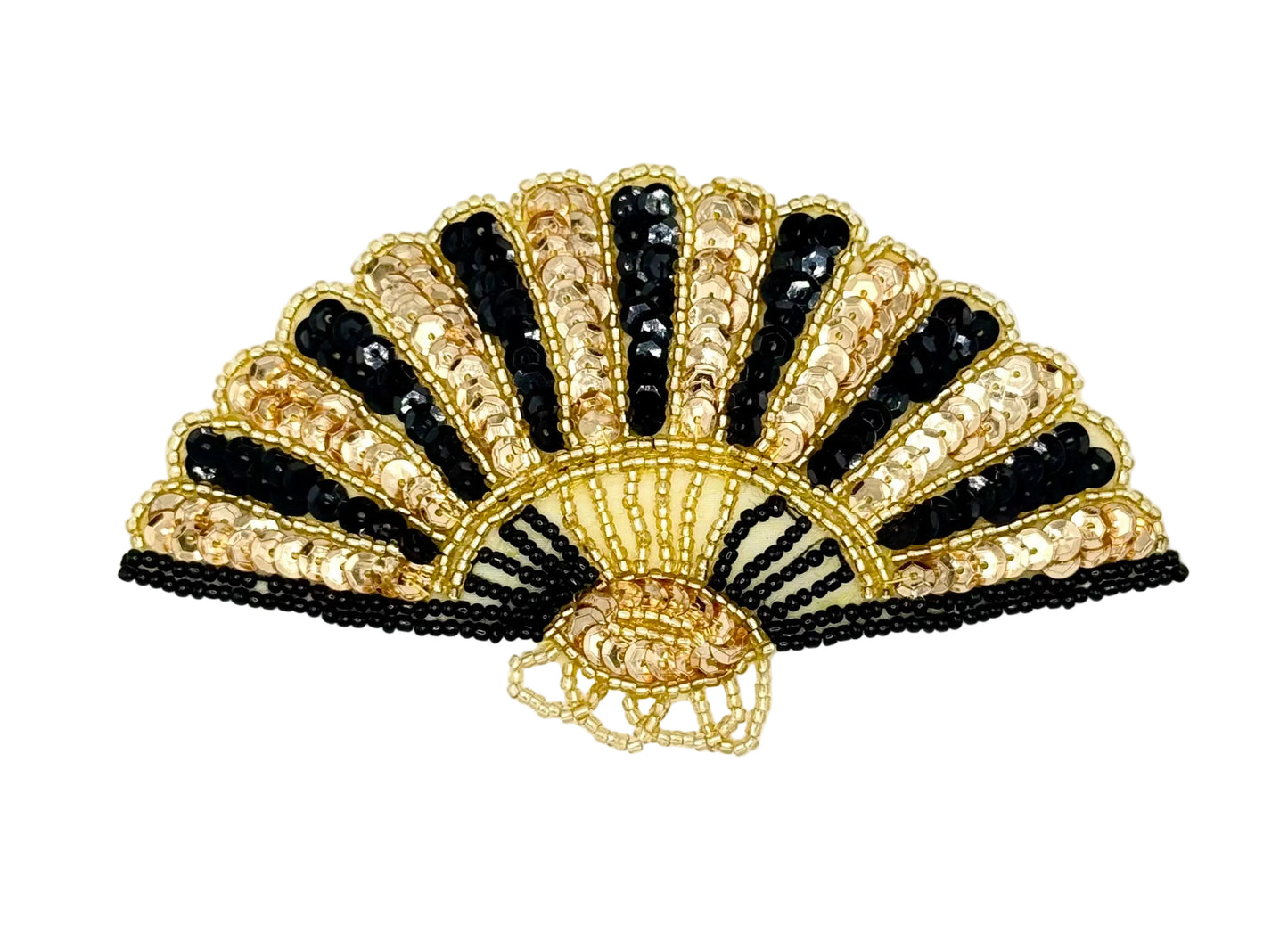 Decorative sequin fan with gold and black design on a white background