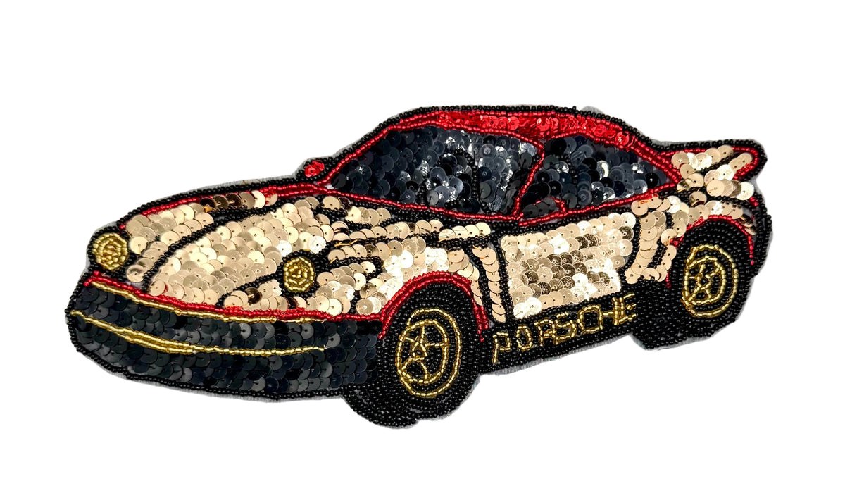 Decorative vintage sequin and bead patch of a Porsche car with sequins on a white background