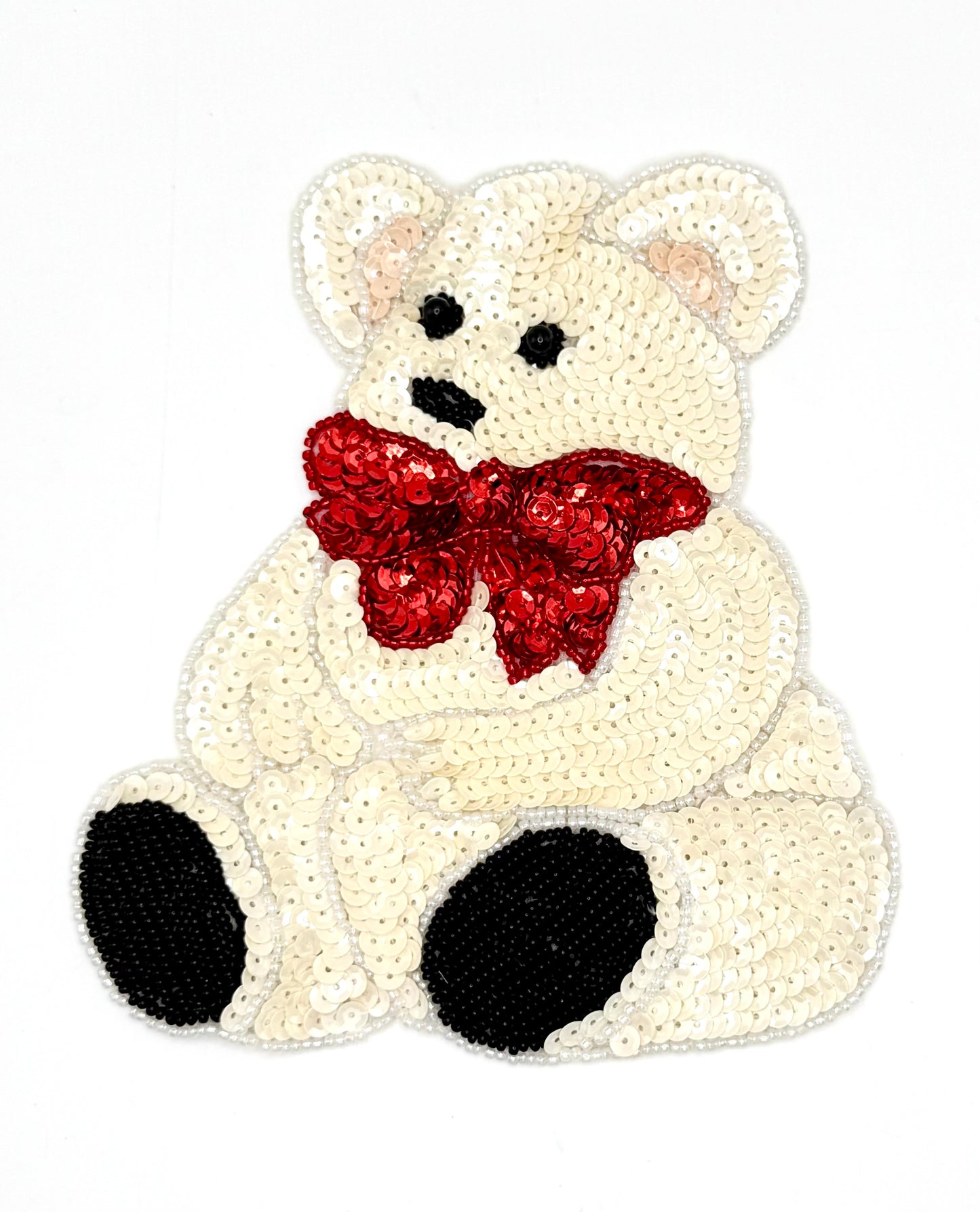 Oso de peluche con lentejuelas crema y lazo rojo 5.75" x 5.25"