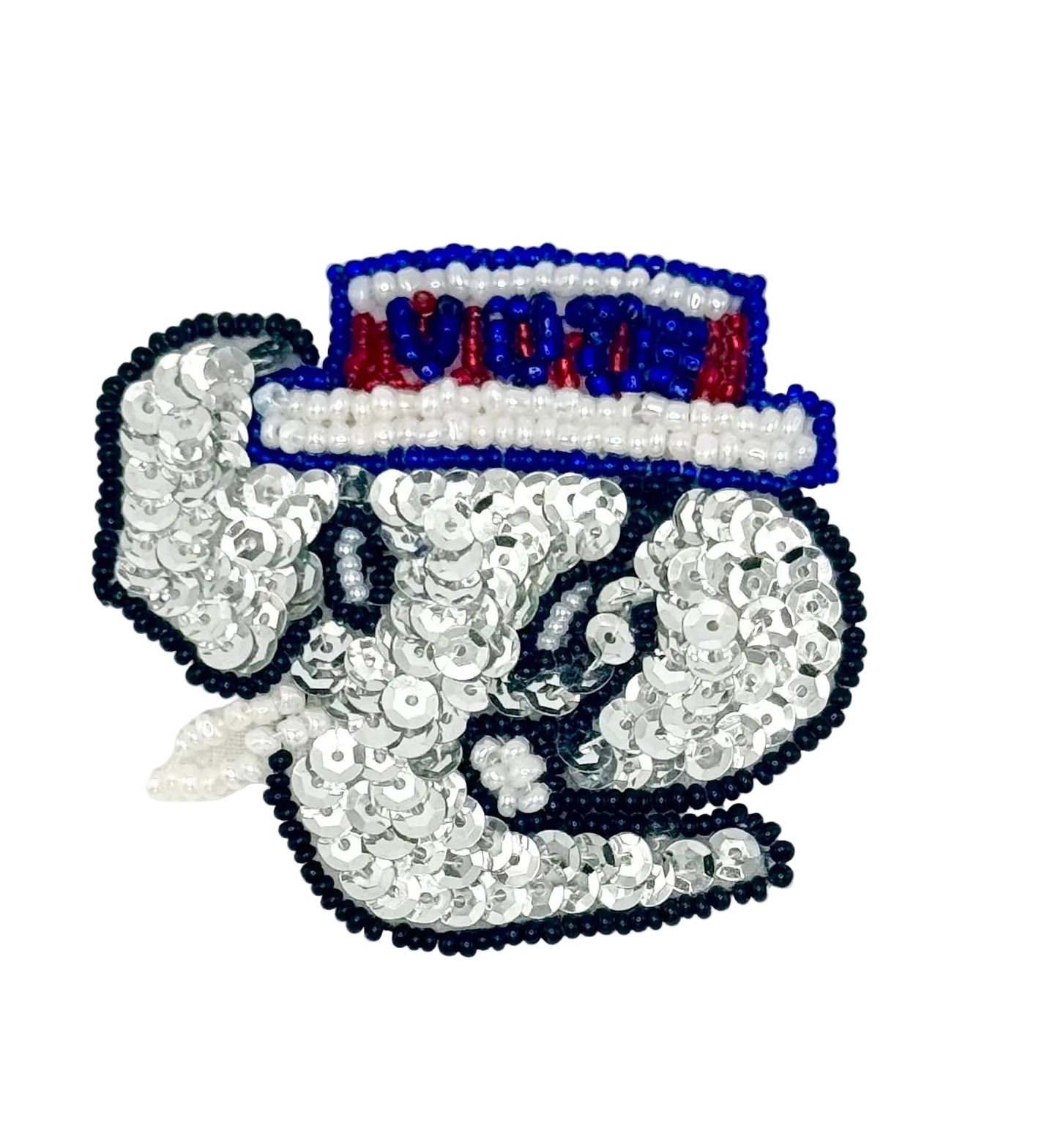 Elephant patch with sequins and beads on a white background. Hat reads Vote
