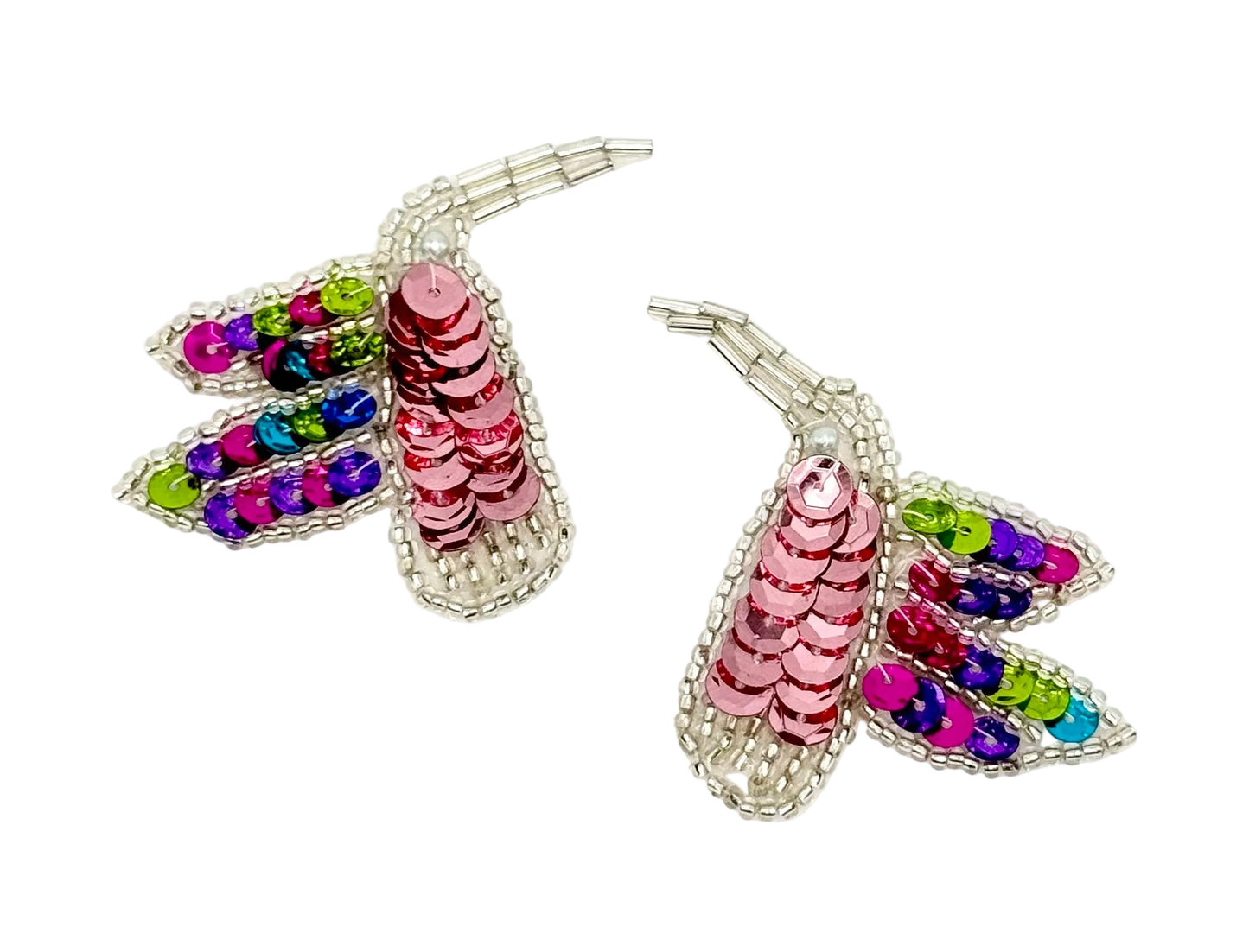 Colorful sequin and beaded hummingbird pair on a white background