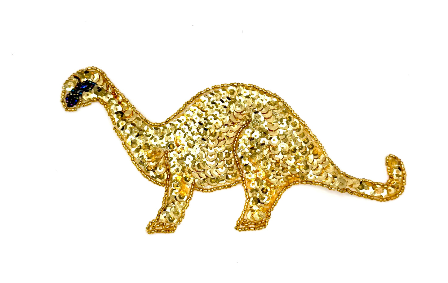 Gold dinosaur-shaped patch with sequins and beads on a white background