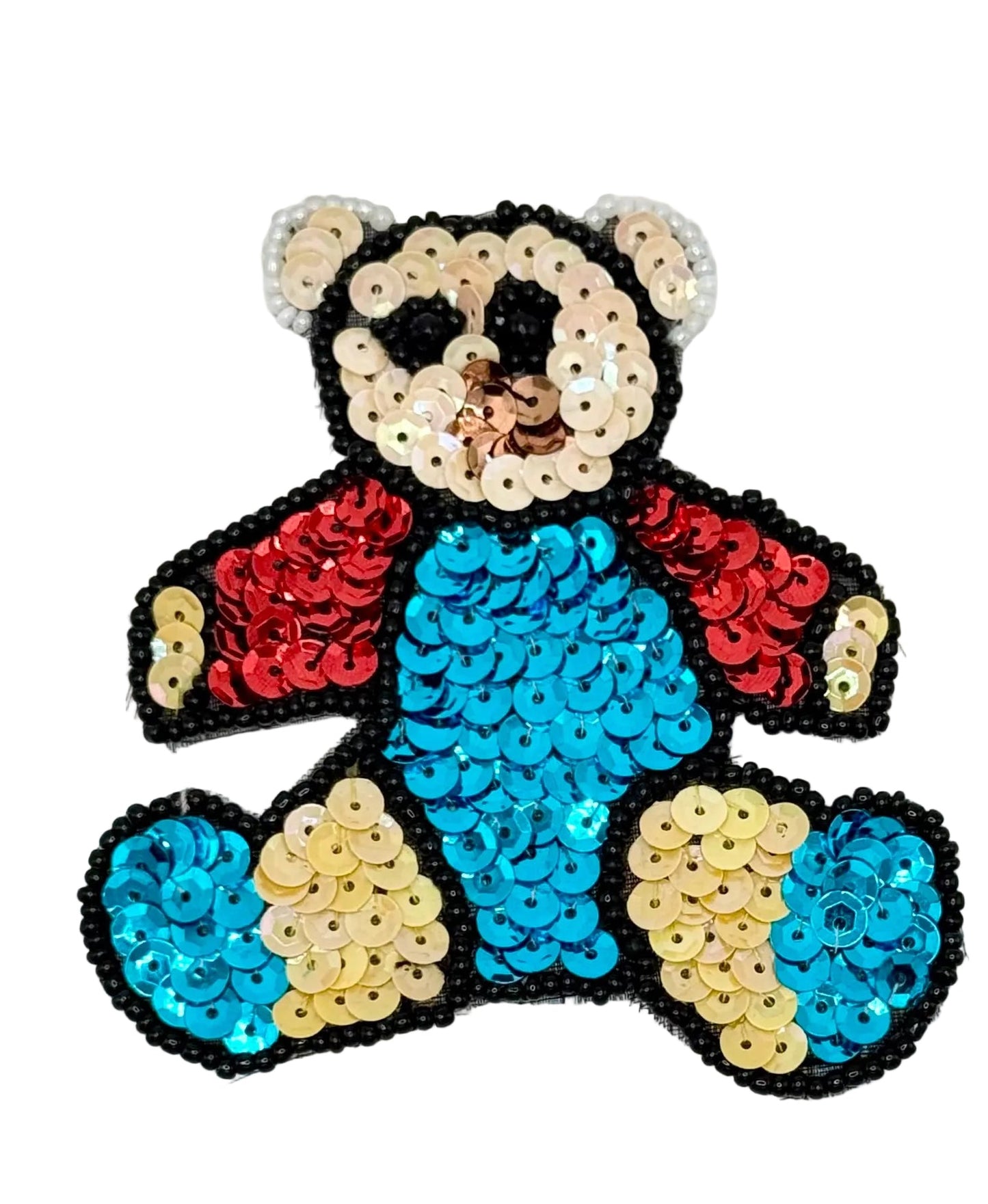 Sequined teddy bear patch on a white background