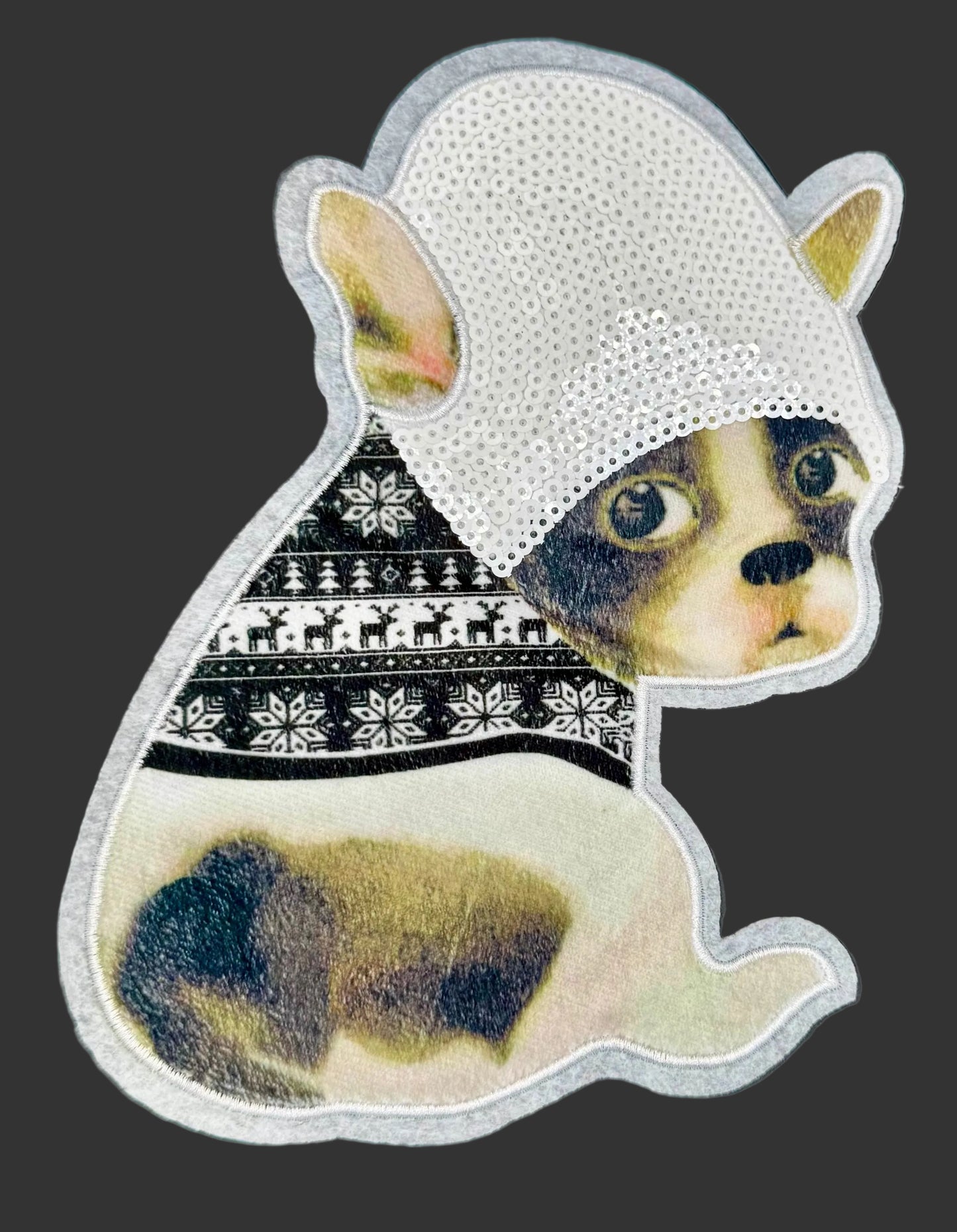 Sequin Dog with a patterned sweater on a dark background