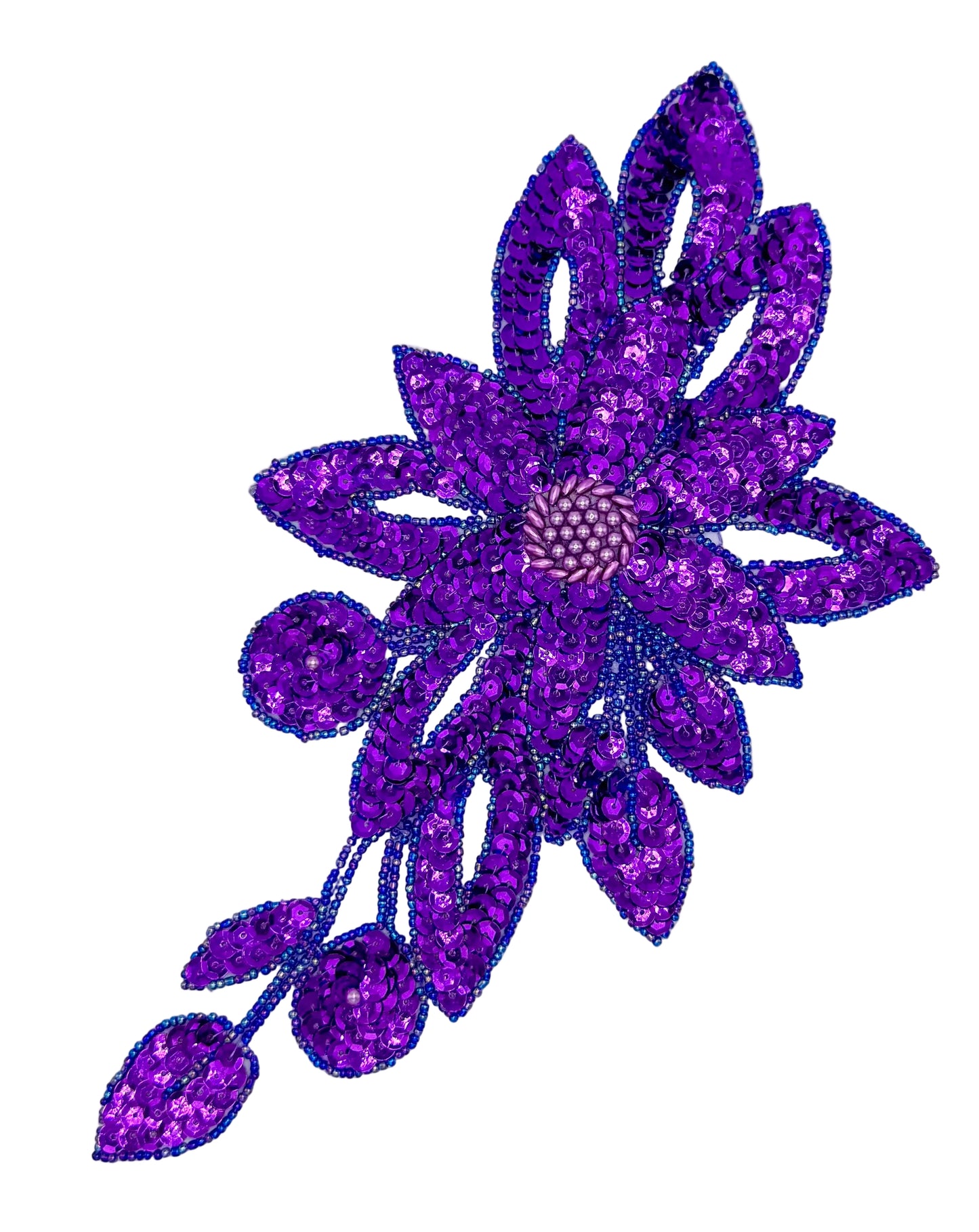 Purple sequin flower embellishment on a white background