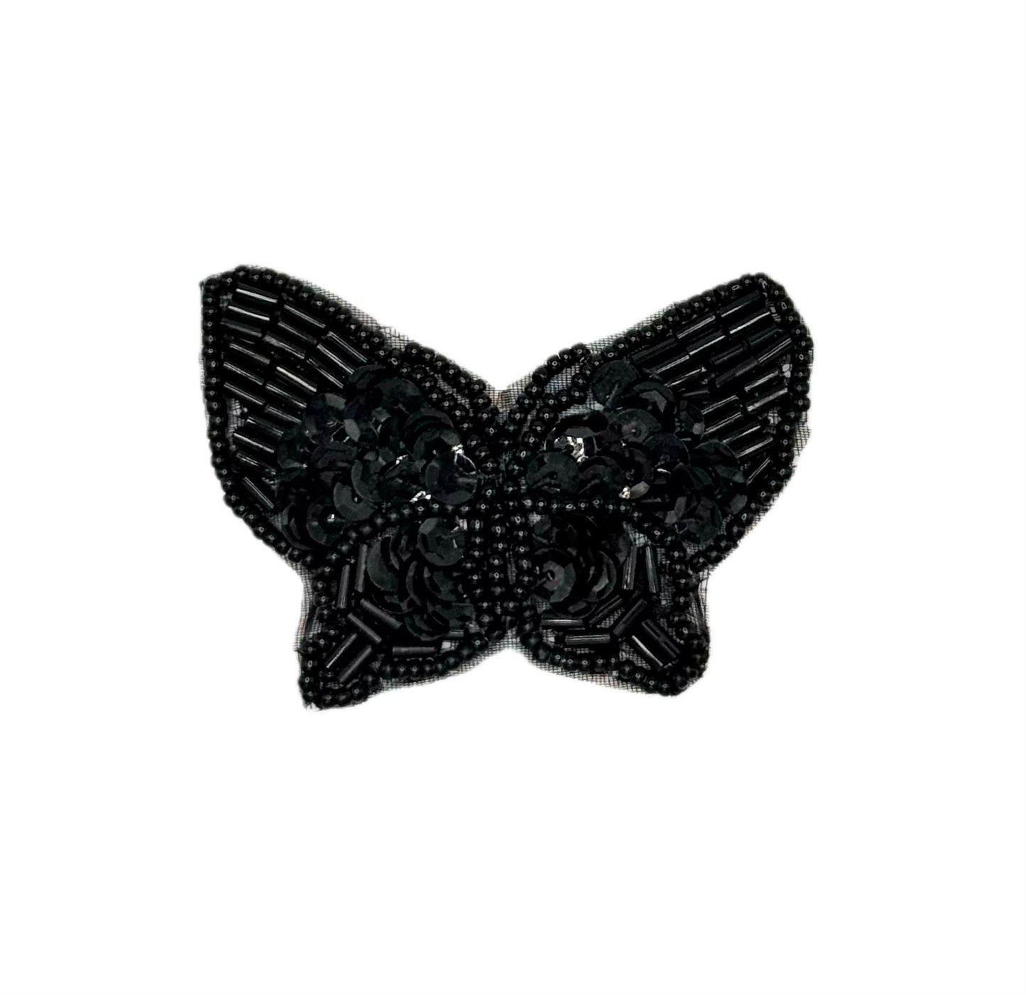 Black butterfly-shaped sequin patch on a white background