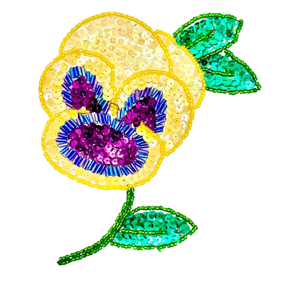 Sequin and bead patch with a yellow and purple flower and green leaves on a white background
