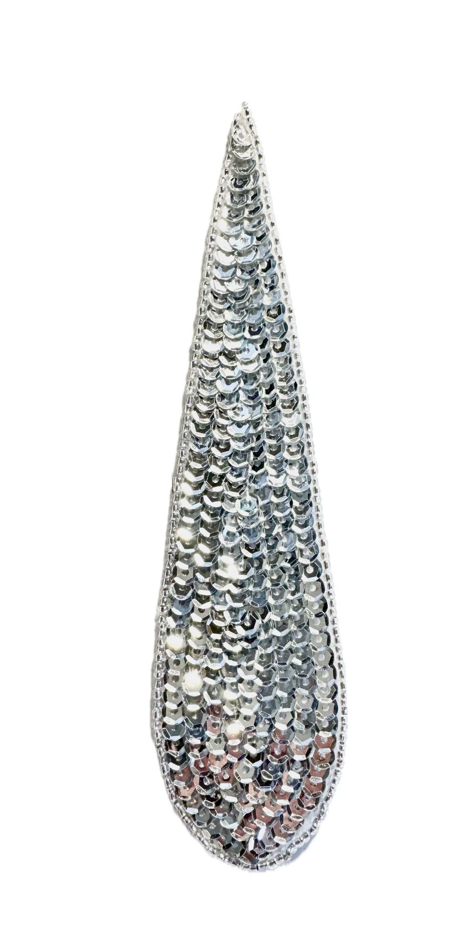Sequin and glass bead teardrop shaped accent on a white background