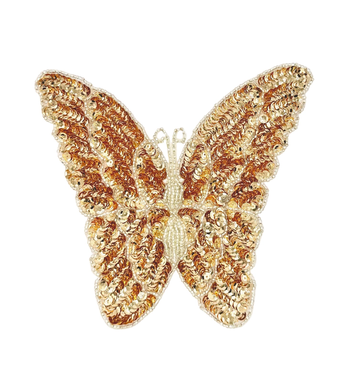 Gold butterfly-shaped patch with sequins on a white background
