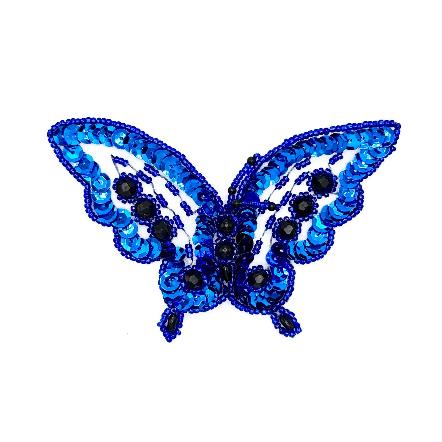 Blue butterfly-shaped patch with sequins and beads on a white background