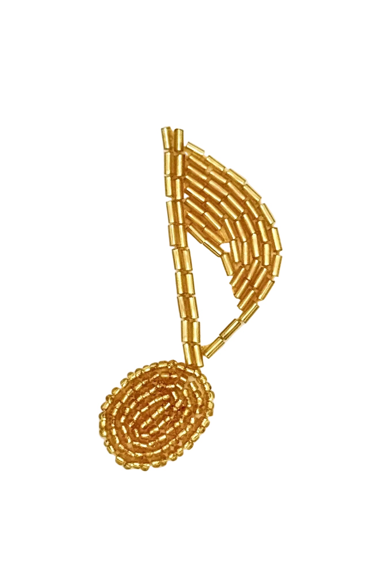 Gold beaded patch shaped like a musical note on a white background
