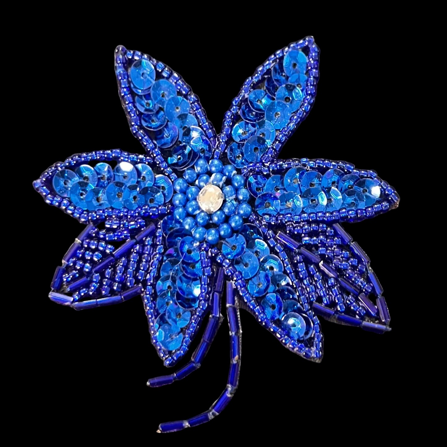 Flor azul con diamantes de imitación 3" x 2.75"
