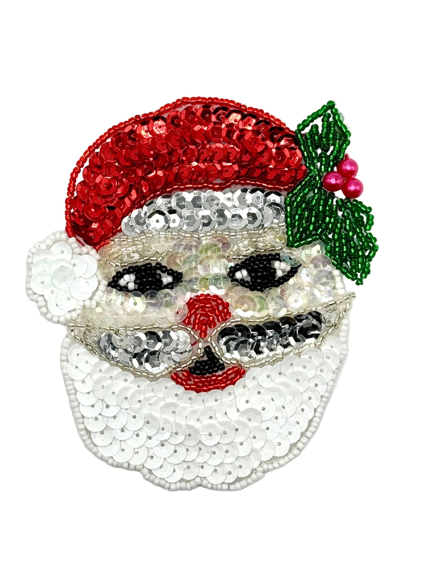 Sequined Santa Claus face with red hat and holly leaf on a white background