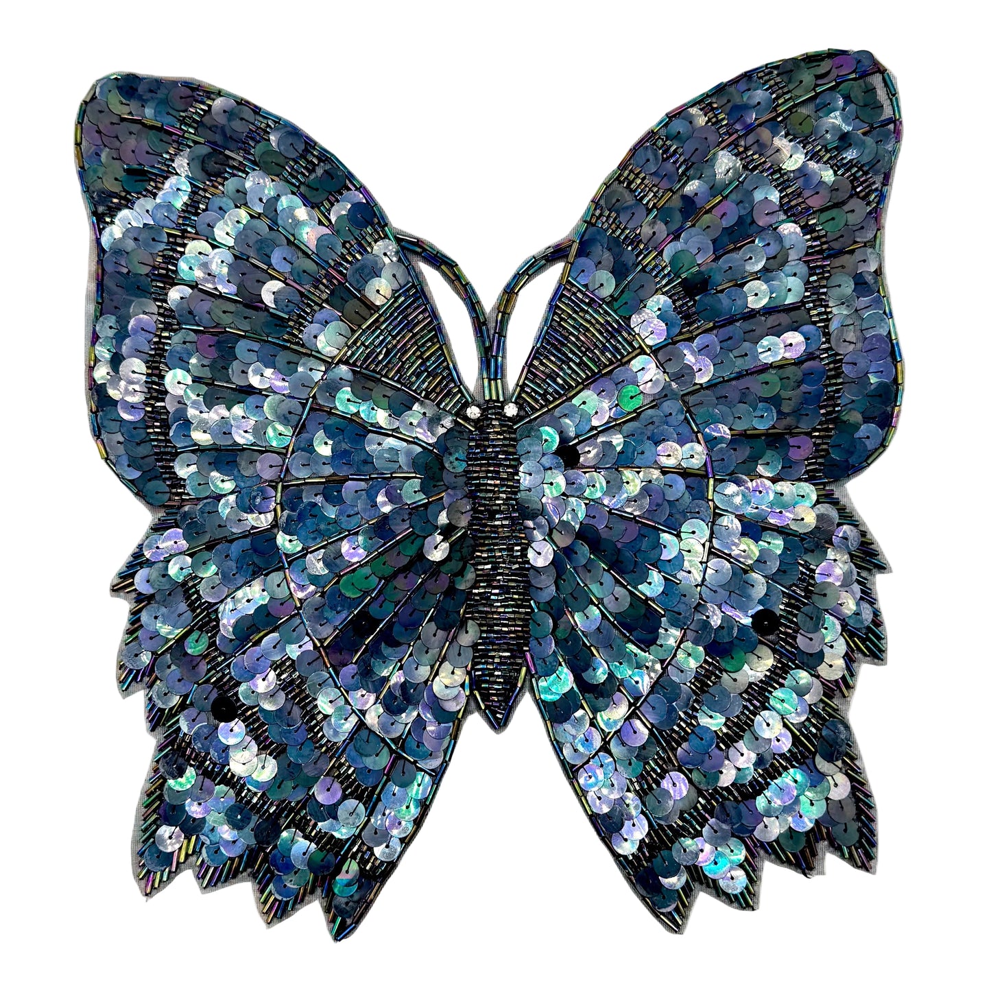 Sequined butterfly with moonlight sequins and beads on a white background