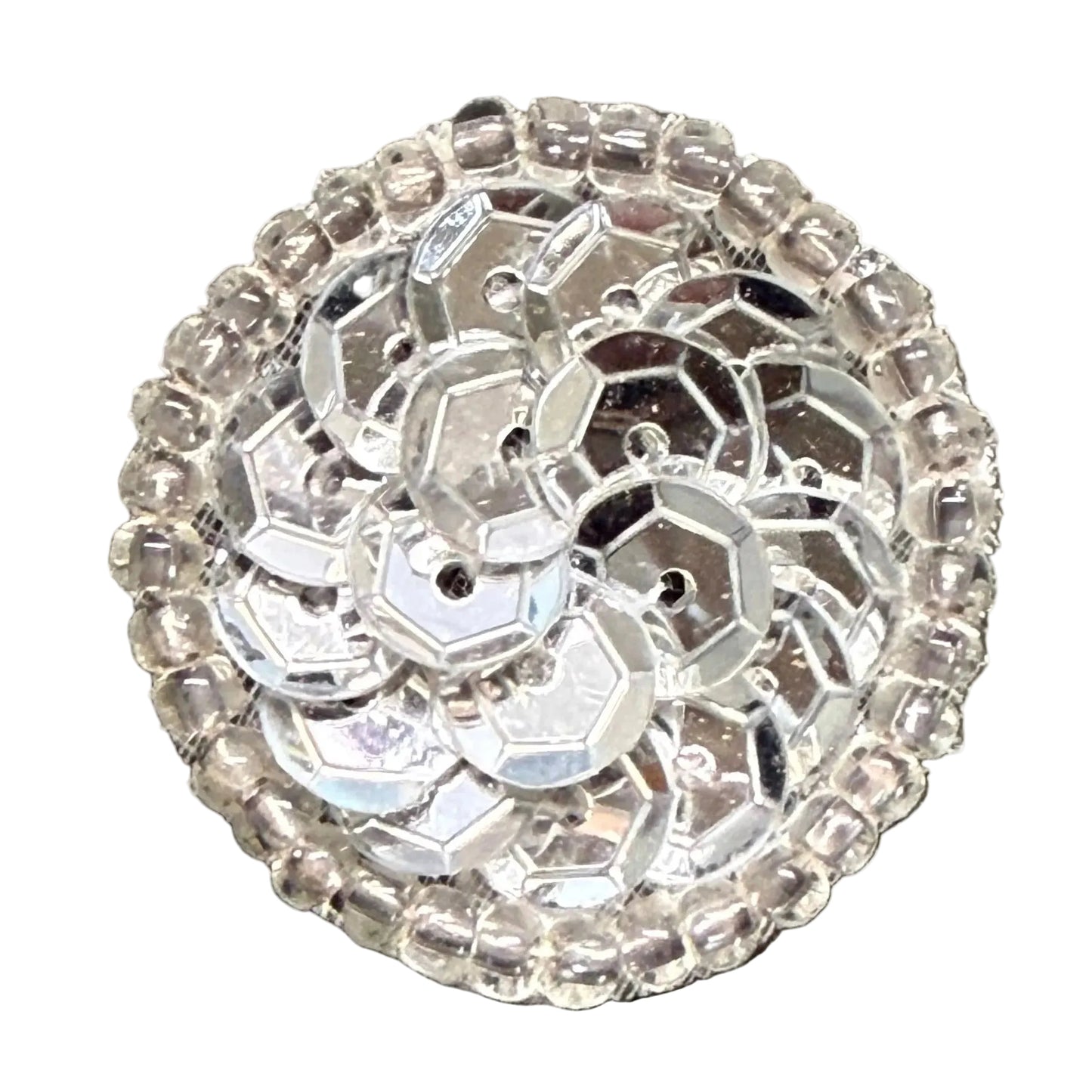 A round decorative embellishment featuring a cluster of silver-toned reflective sequins in the center and a border of clear glass beads, shown on a plain white background.