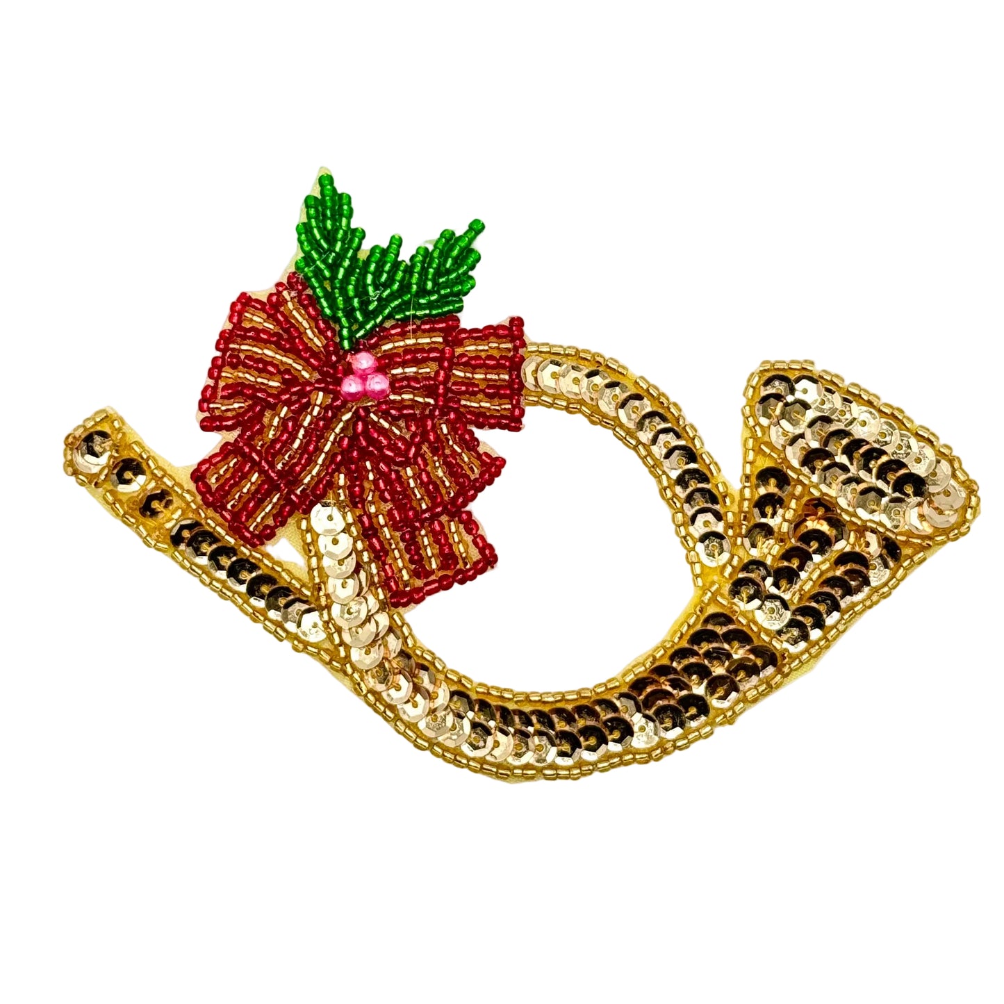 Decorative Christmas appliqué with red bow and gold horn on a white background