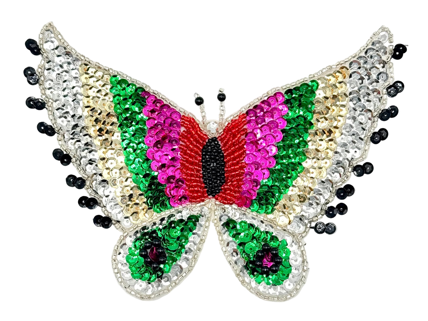 Butterfly-shaped decorative item with sequins and beads on a white background