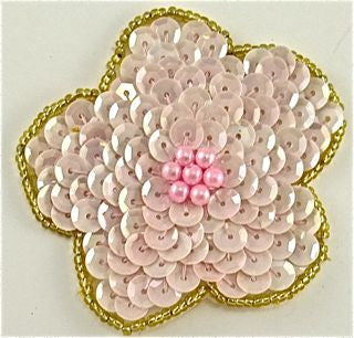 Flor con lentejuelas y cuentas rosas
