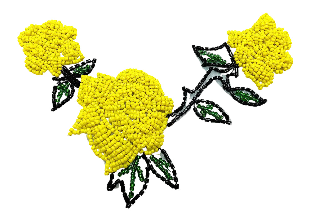 Yellow beaded flowers with green leaves on a white background