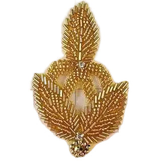 Motivo de hoja en dorado con pedrería 4" x 2.5"
