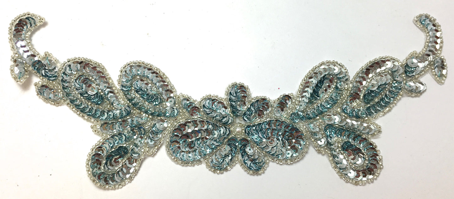Flor con lentejuelas y abalorios, dos colores azul hielo y blanco China 3.5" x 10"