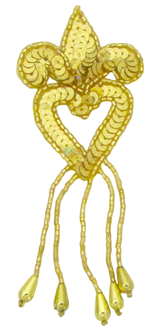 Gold decorative appliqué with flour de lis shape and hanging elements on a white background