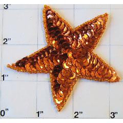 Estrella con lentejuelas naranjas 3"