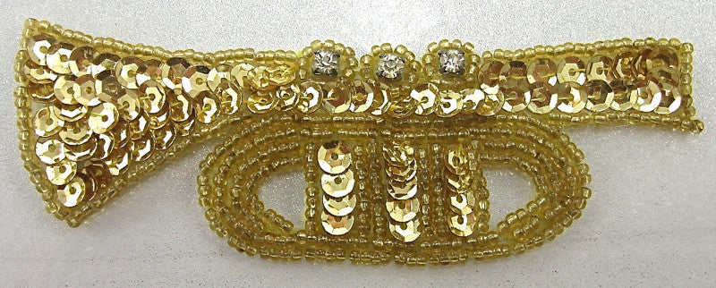 Trompeta con pedrería, lentejuelas doradas y abalorios 10,16 cm x 4,45 cm