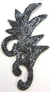 Hoja con cuentas de carbón