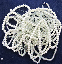 Load image into Gallery viewer, Loose Beads on String White &amp; Iridescent 1/8&quot; Wide Beads, 1.3oz bag